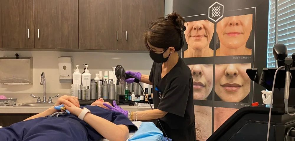 Physician performing an aesthetic treatment at VitaleHEALTH